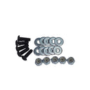 Set of metal washers and screws on a gray background