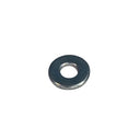 Metal washer on a textured white background